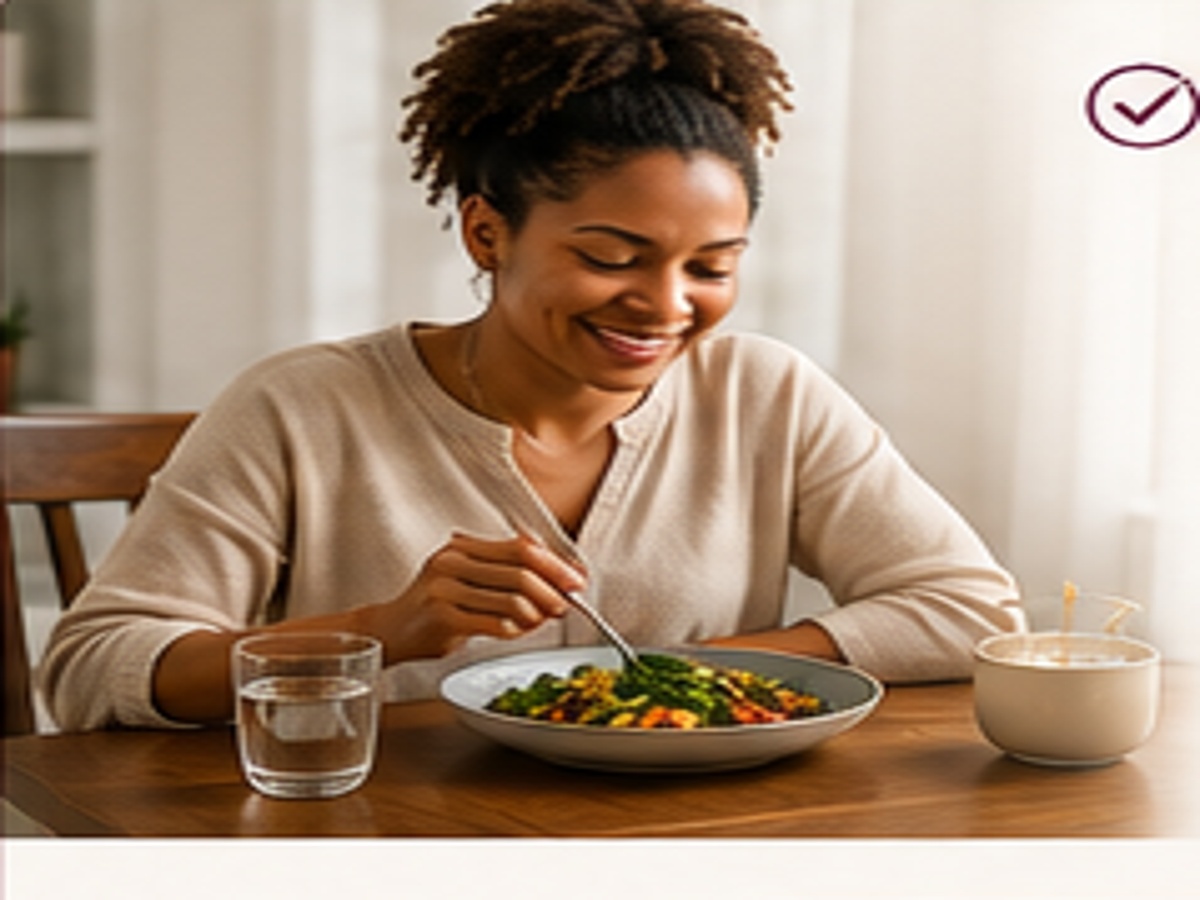 A relaxed woman sitting at her dining table enjoying a prepared meal