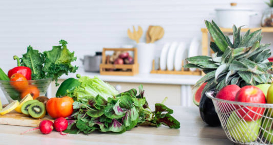 Fresh produce arranged in a bright kitchen